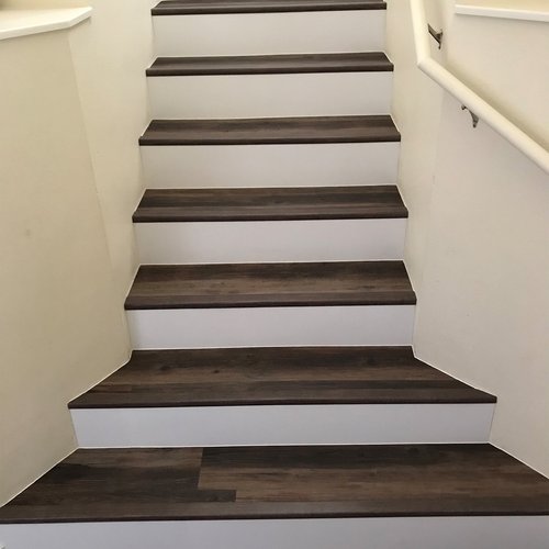 Dark wood flooring on stairs