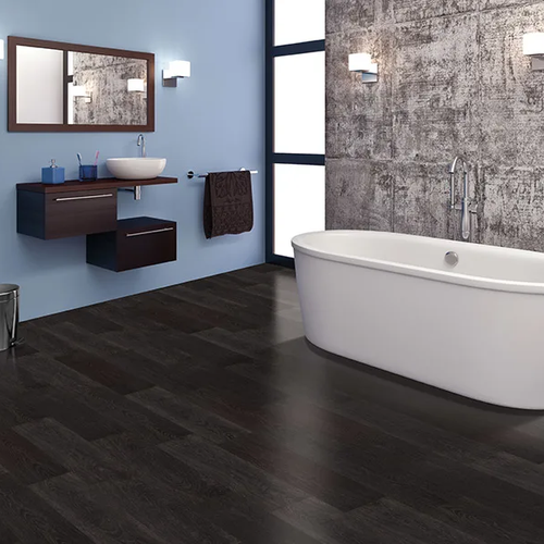 Dark waterproof LVP floors in a bathroom