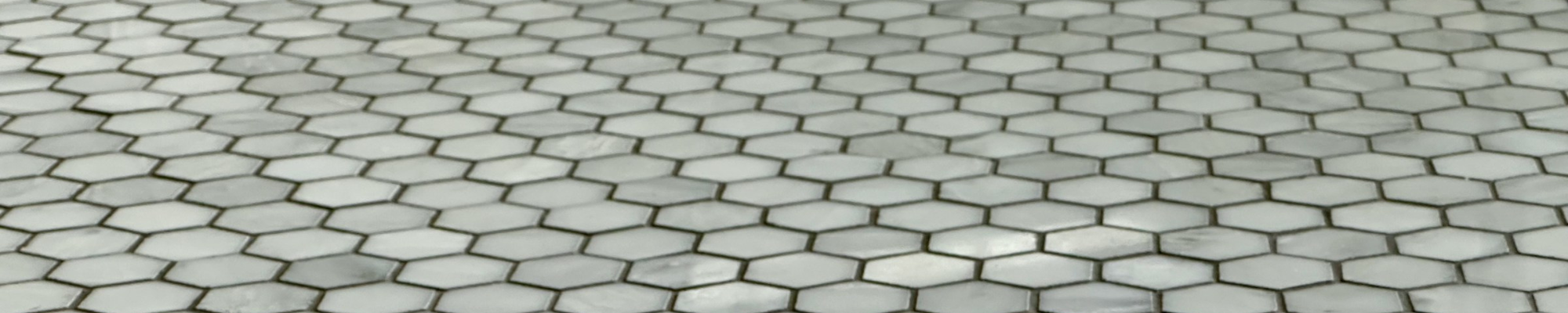 Tile in a honeycomb pattern